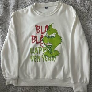 White Crewneck Sweatshirt with Green Grinch Graphic